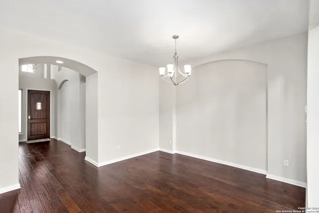 a view of a livingroom with wooden floor