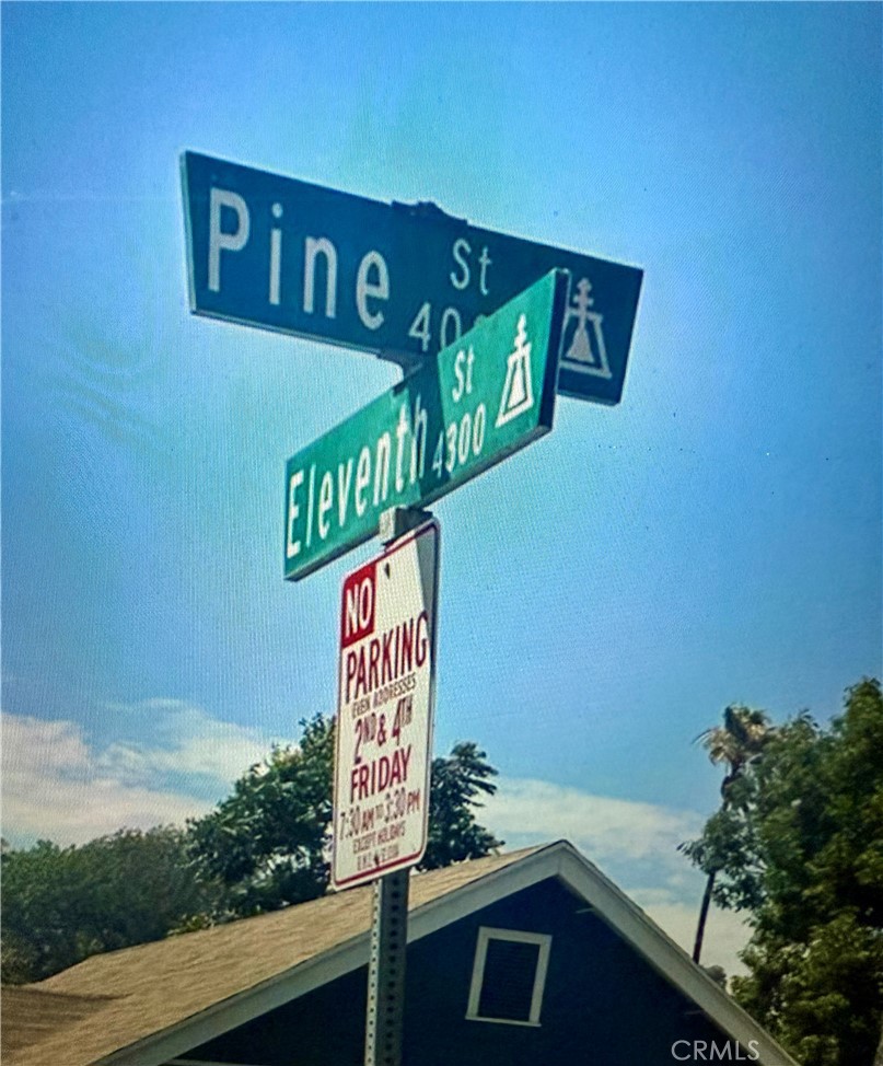 4096 Pine Street Riverside, CA 92501 - Photo 9 of 12 a street sign that is on a pole