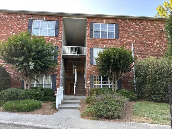 a sign that is on the side of a building