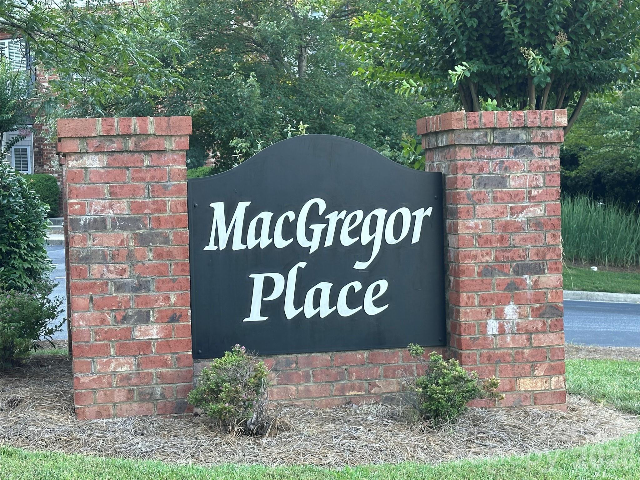 5236 Hilltop Road Jamestown, NC 27282 - Photo 2 of 32 a sign that is on the side of a building