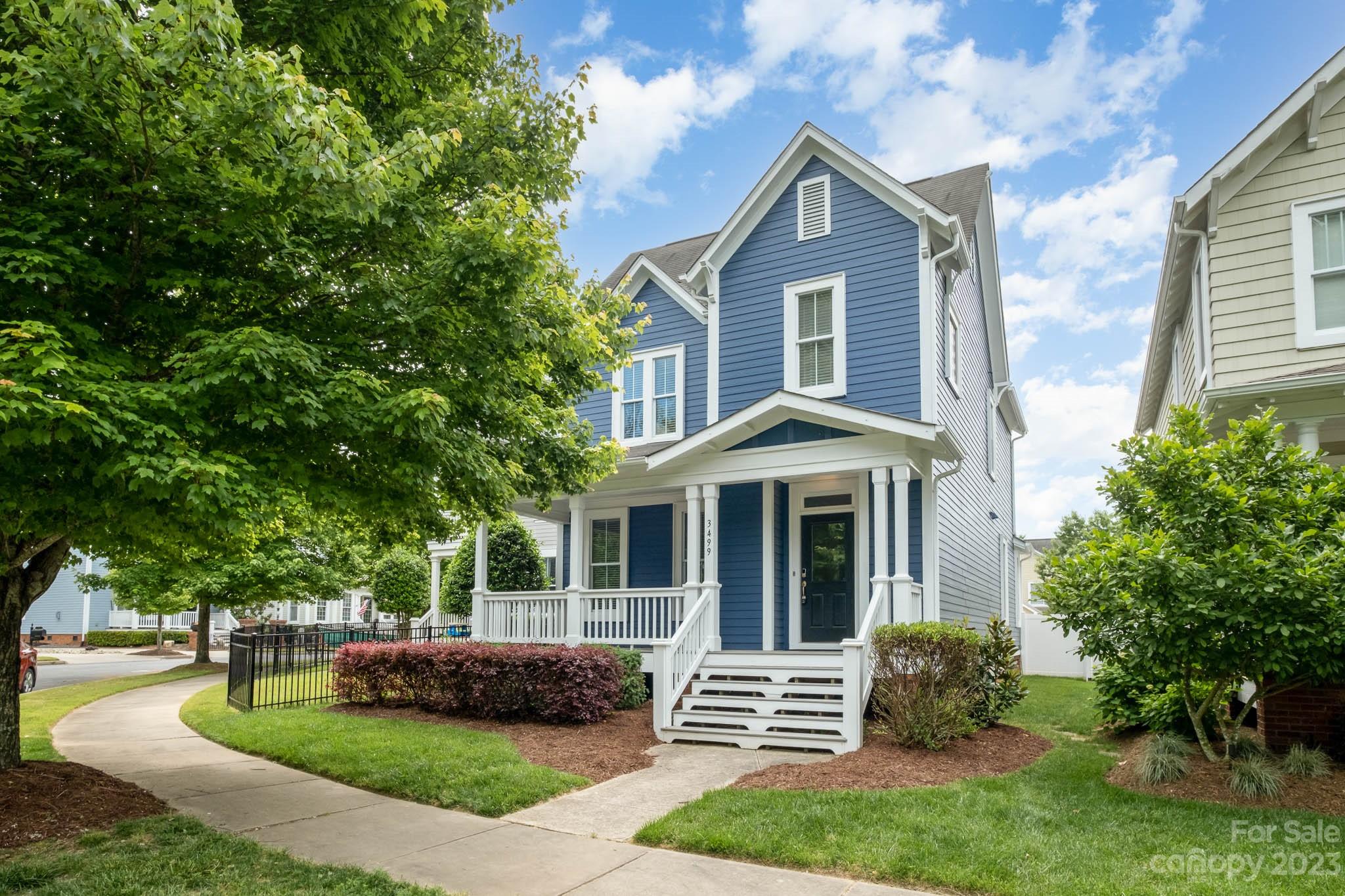 3499 Richard's Crossing Fort Mill, SC 29708 - Photo 1 of 33 a front view of a house with a yard