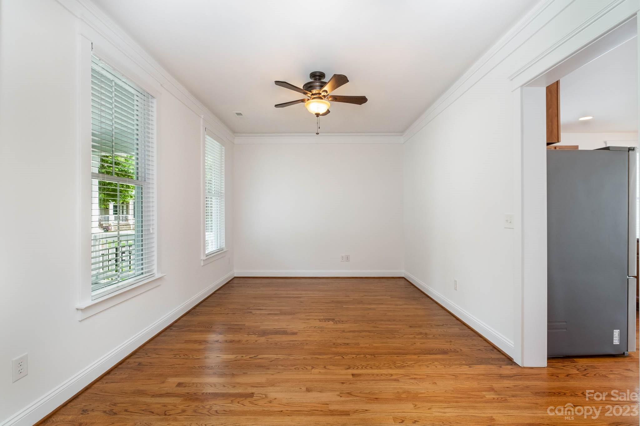 3499 Richard's Crossing Fort Mill, SC 29708 - Photo 16 of 33 wooden floor in an empty room with a window