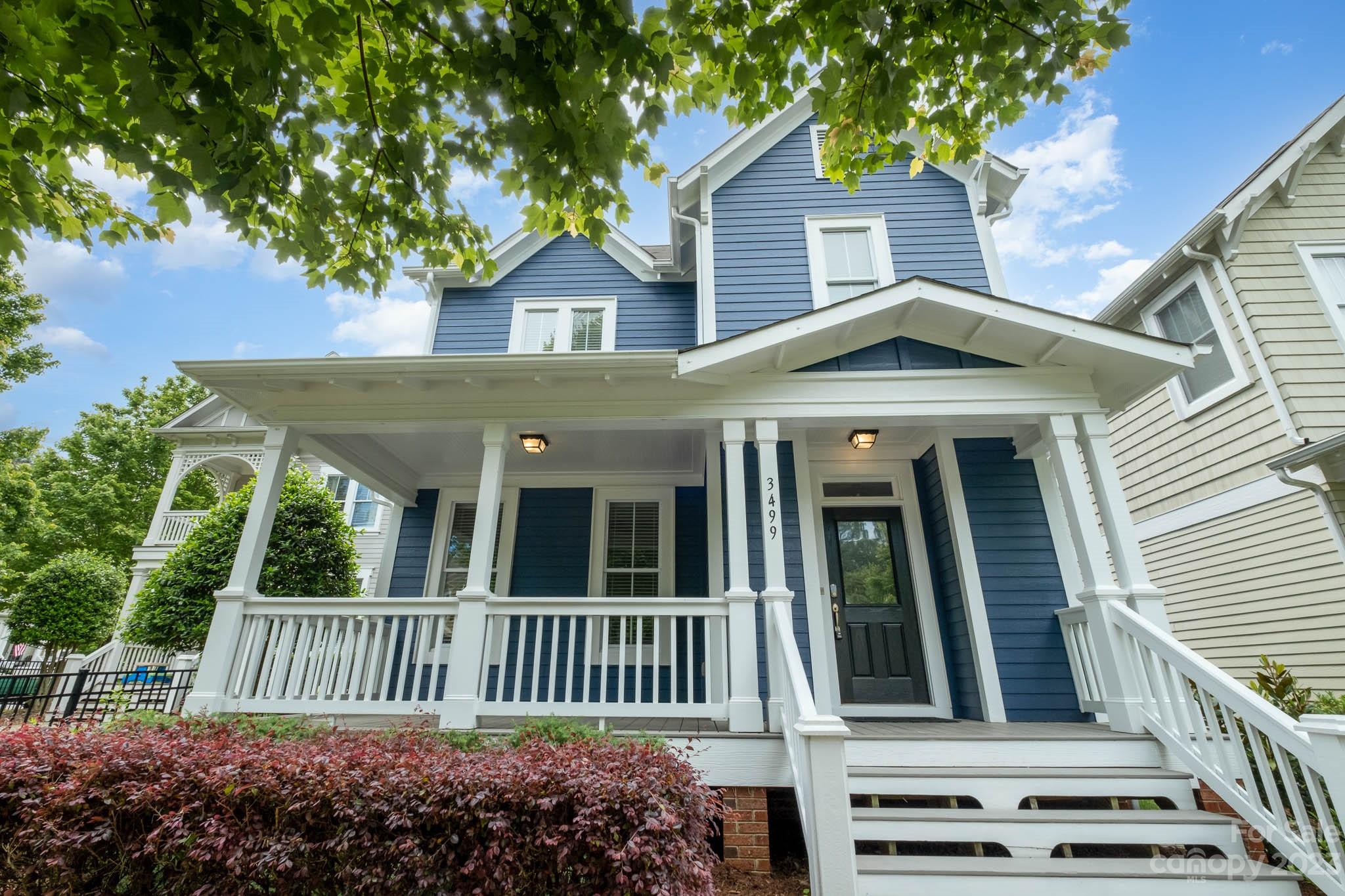 3499 Richard's Crossing Fort Mill, SC 29708 - Photo 2 of 33 a front view of a house with a garden