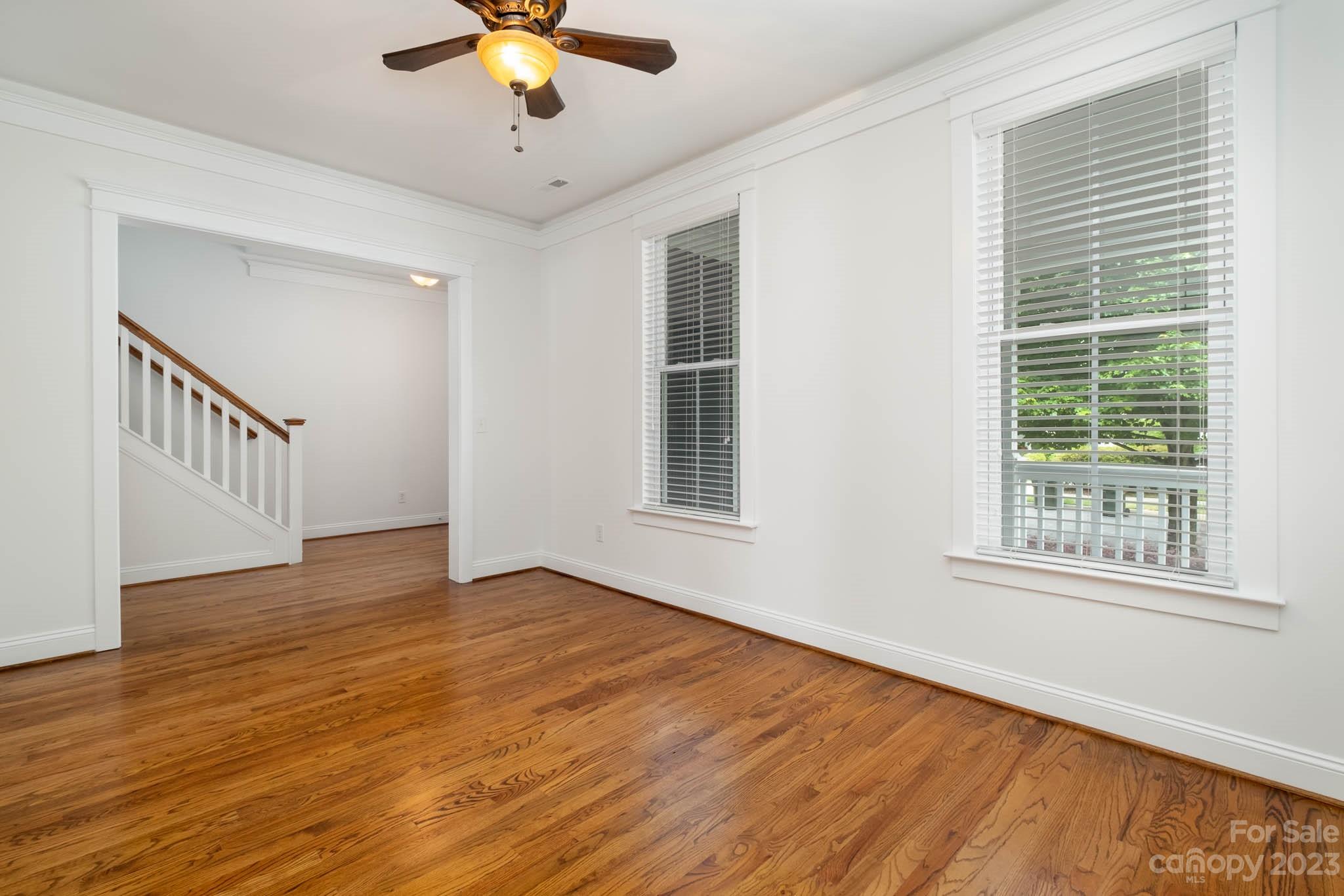 3499 Richard's Crossing Fort Mill, SC 29708 - Photo 6 of 33 a view of an empty room with wooden floor and a window