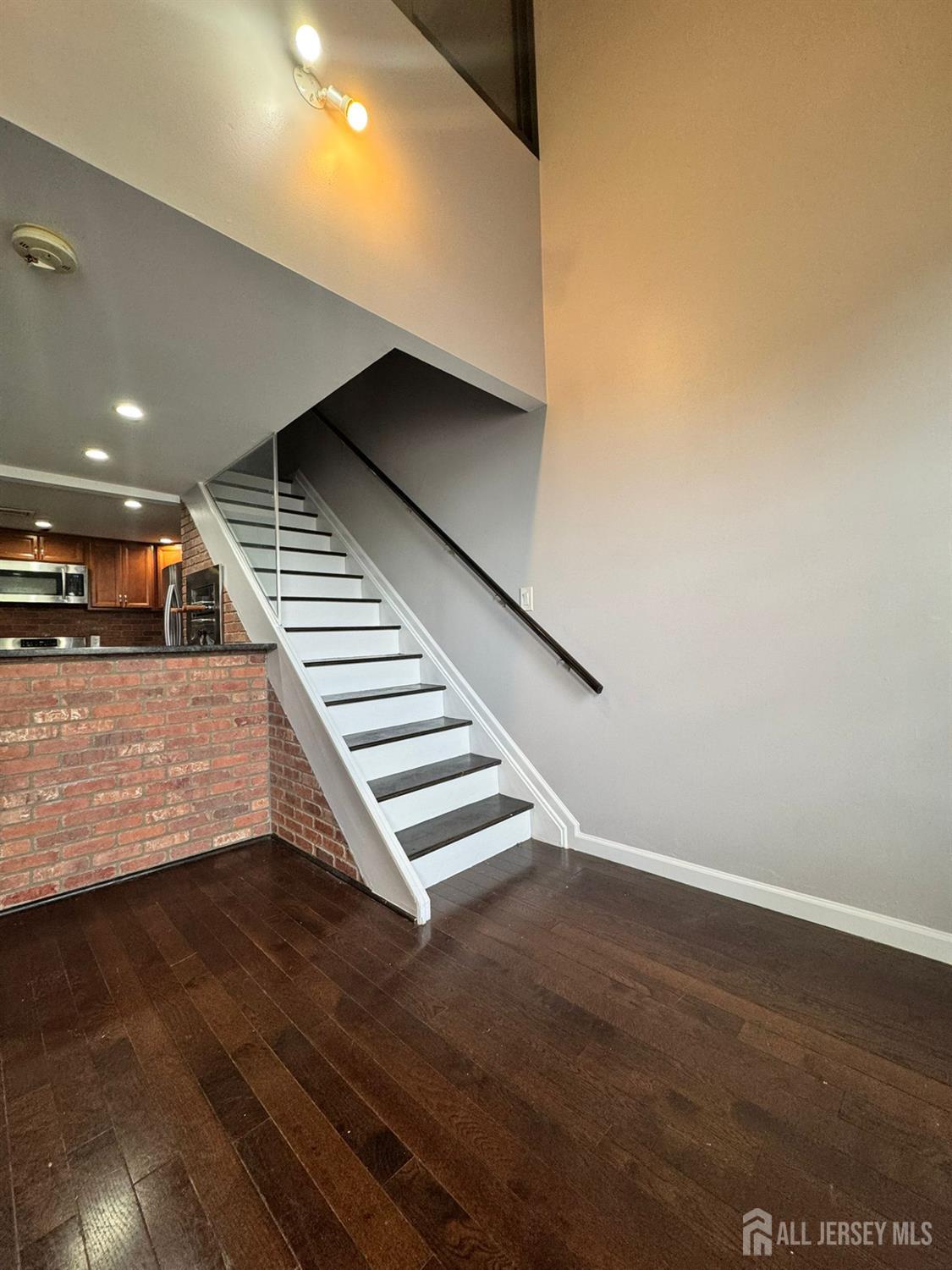 16 Jaques Street, Unit 22 Elizabeth, NJ 07201 - Photo 17 of 27 a view of an entryway with wooden floor