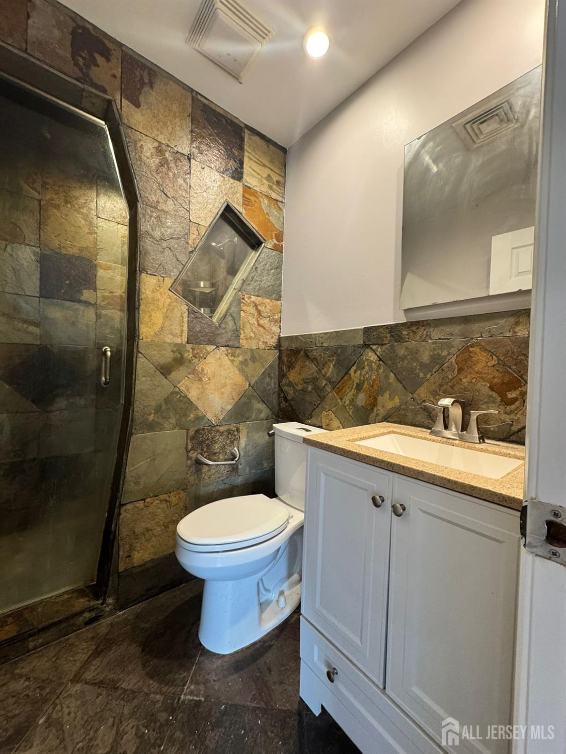 16 Jaques Street, Unit 22 Elizabeth, NJ 07201 - Photo 25 of 27 a bathroom with a toilet and a sink