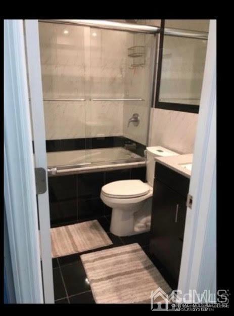 16 Jaques Street, Unit 22 Elizabeth, NJ 07201 - Photo 6 of 27 a bathroom with a toilet and a shower
