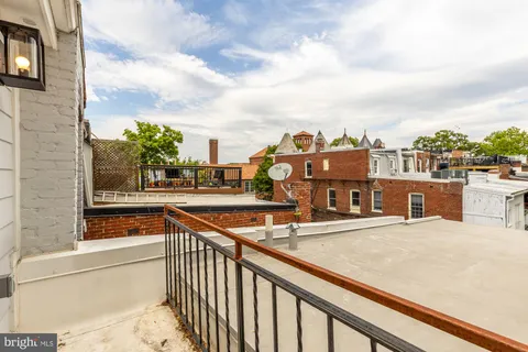 a view of a building from a balcony