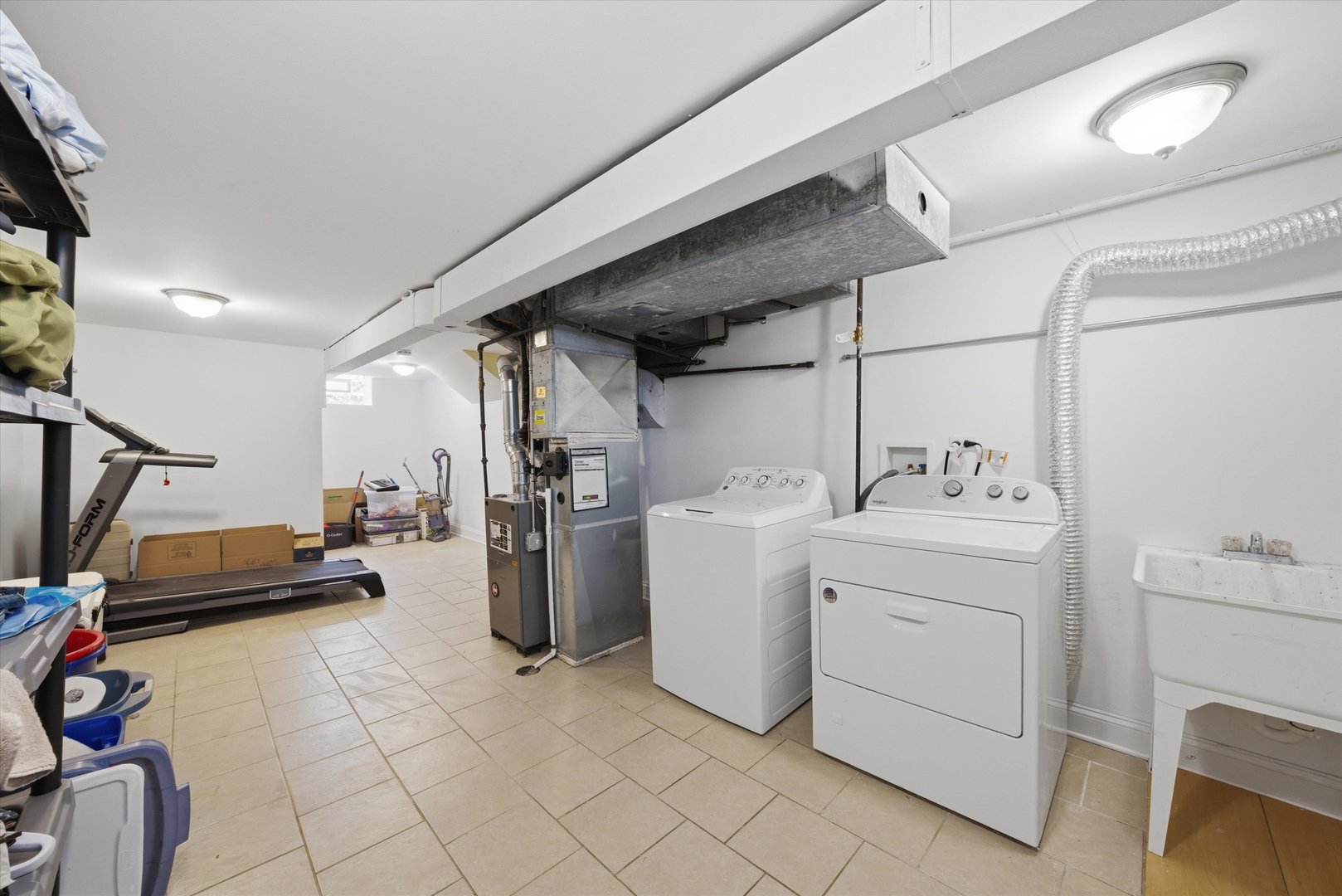 748 Ash Street Flossmoor, IL 60422 - Photo 9 of 21 a view of storage and utility room with washer and dryer