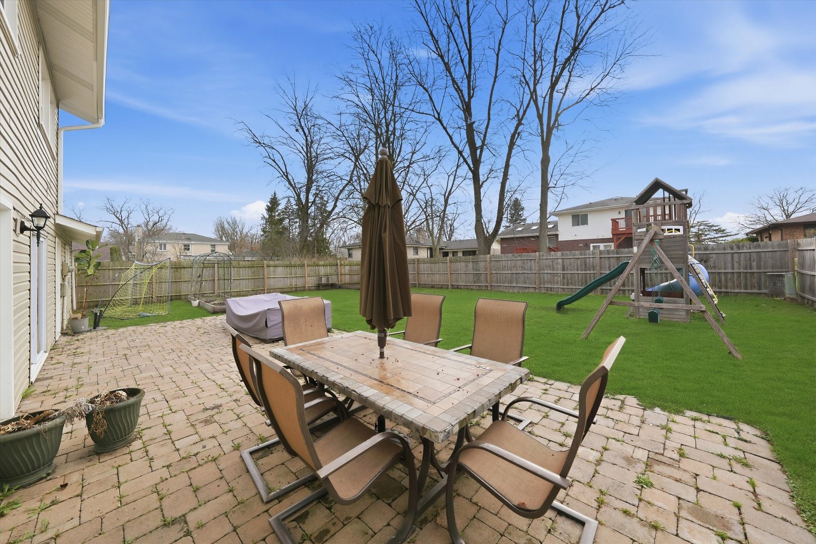 748 Ash Street Flossmoor, IL 60422 - Photo 12 of 21 a view of a backyard with sitting area