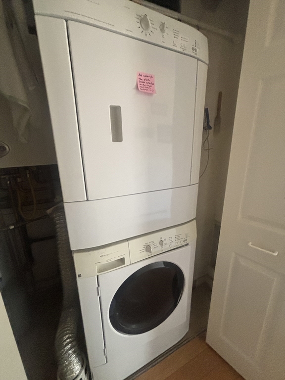 132 Bay Street, Unit 8 Hull, MA 02045 - Photo 8 of 8 a utility room with dryer and washer