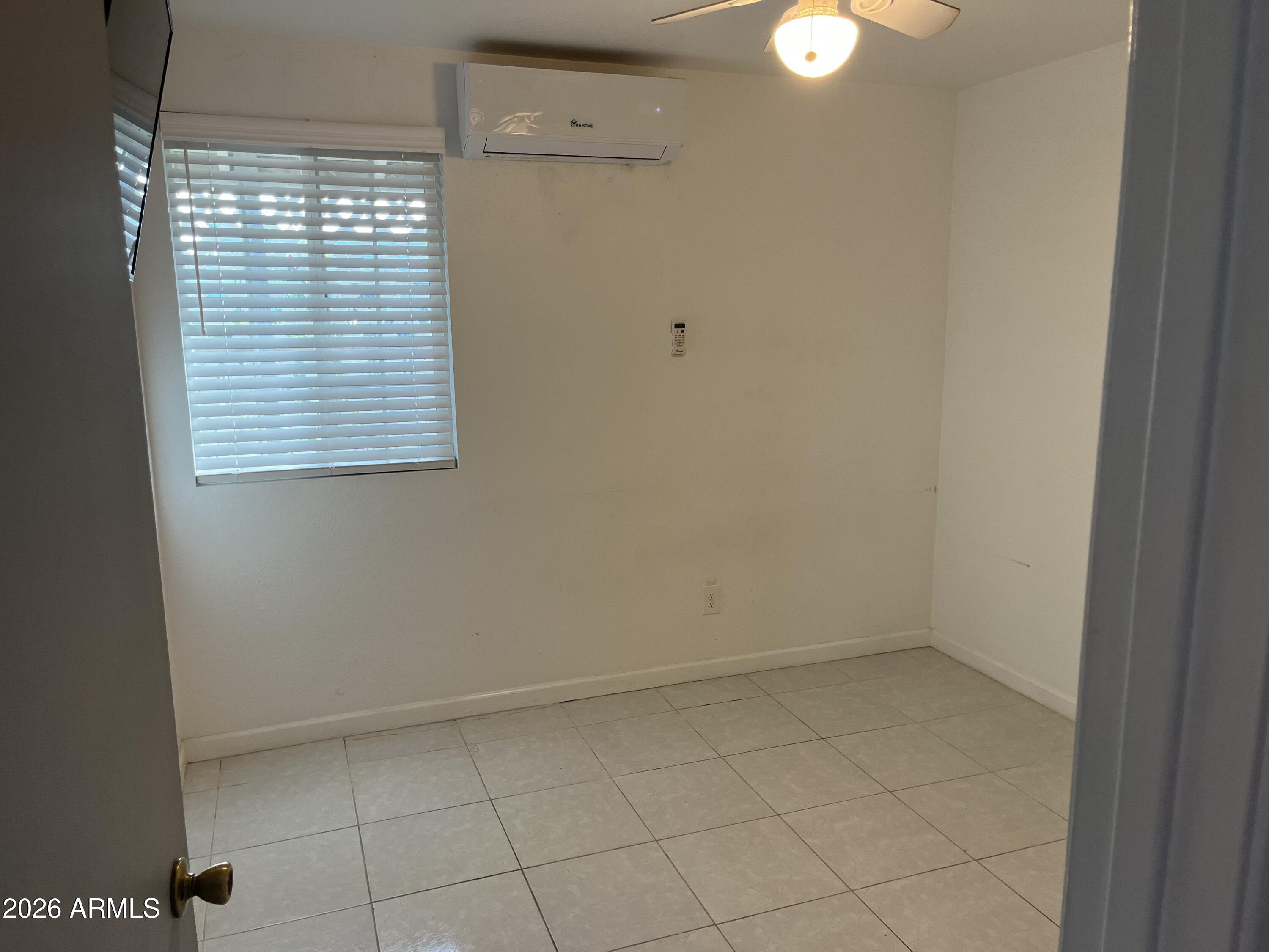 4112 West Hearn Road Phoenix, AZ 85053 - Photo 13 of 13 a view of room and window