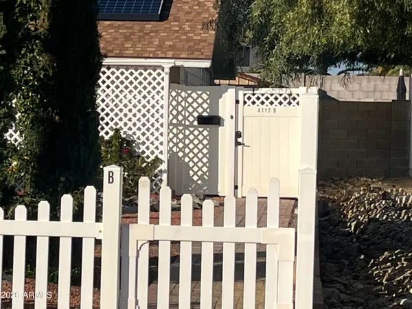 a view of a wooden fence