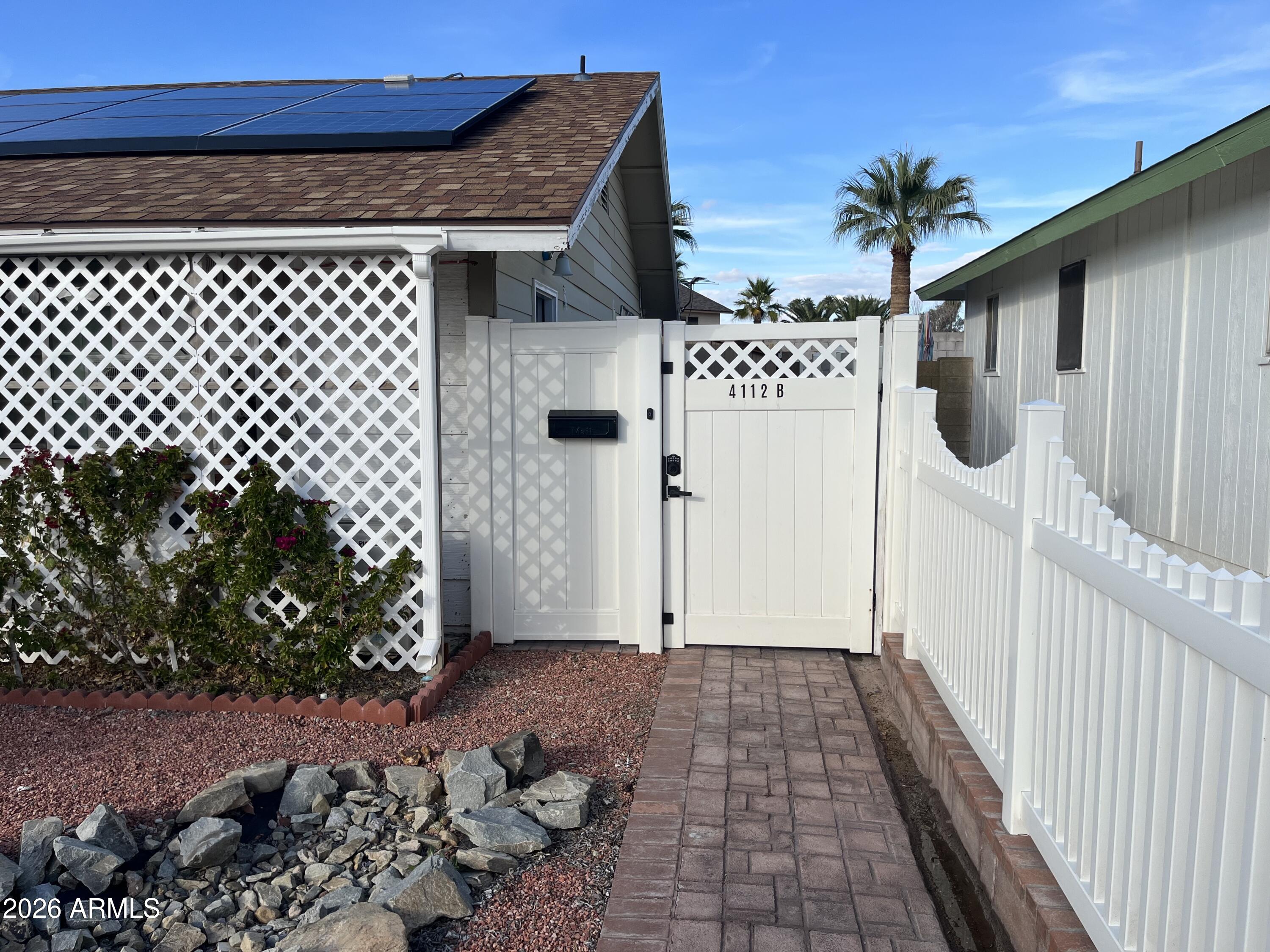 4112 West Hearn Road Phoenix, AZ 85053 - Photo 9 of 13 a view of a wooden door