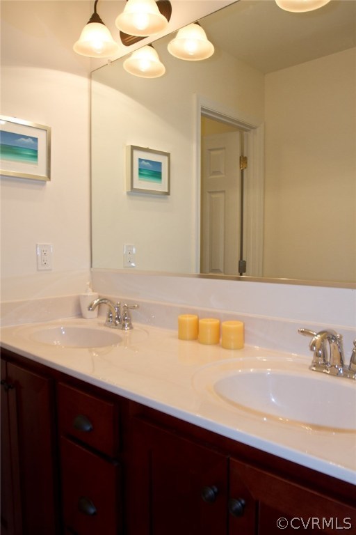11019 Avening Road Chesterfield, VA 23832 - Photo 11 of 14 a bathroom with a sink and a mirror