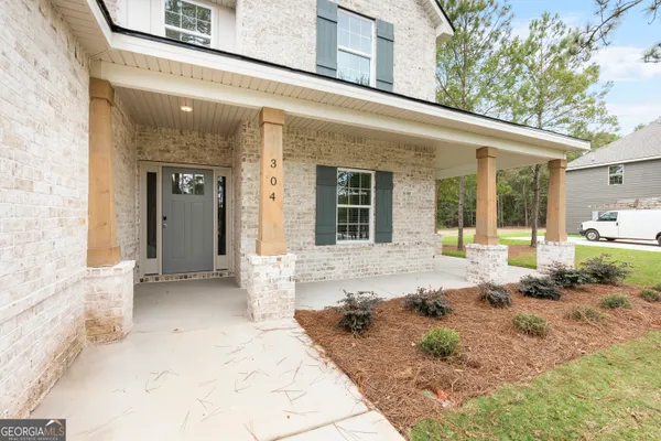 a view of a house with a patio