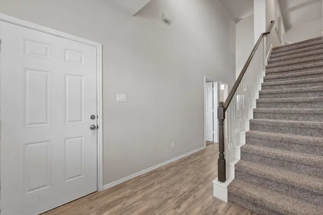 a view of storage and utility room with washer and dryer