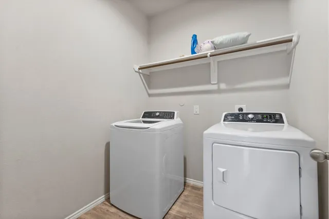 a bedroom with a bed and a cabinets