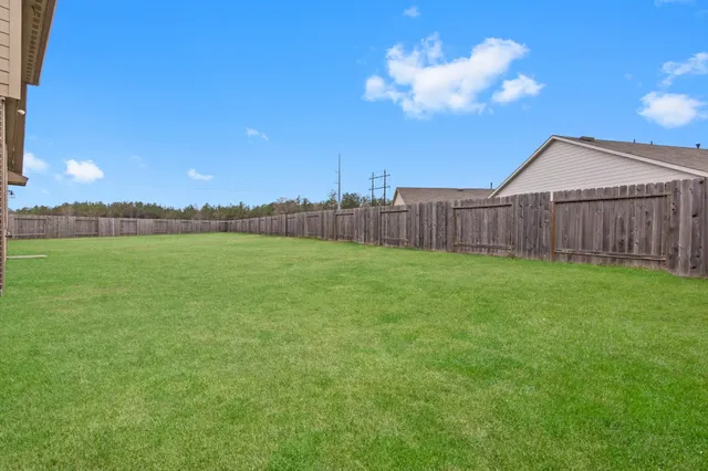 a view of a backyard with a garden