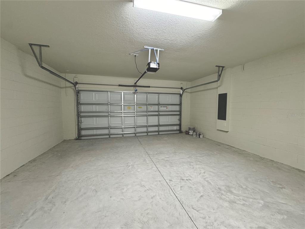 3703 Haddon Avenue Davenport, FL 33837 - Photo 20 of 23 a view of a garage