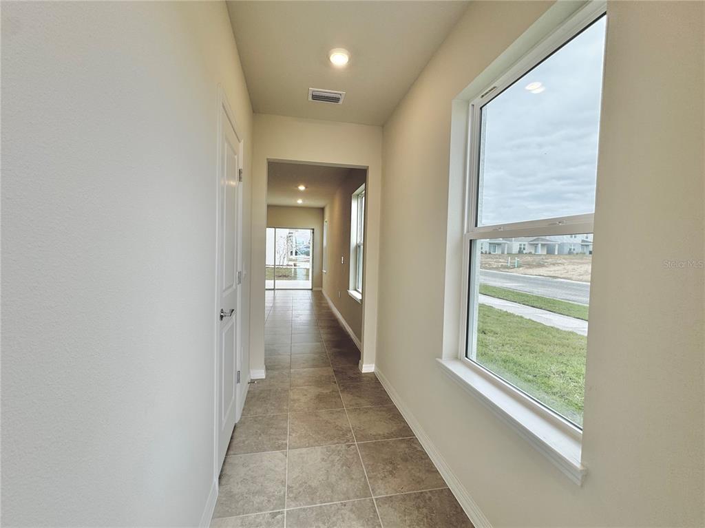 3703 Haddon Avenue Davenport, FL 33837 - Photo 6 of 23 a view of a hallway