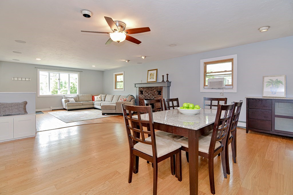 211 Beacon Street Framingham, MA 01701 - Photo 11 of 42 a view of a dining room with furniture and wooden floor