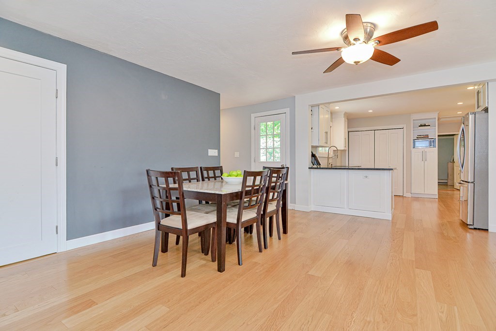 211 Beacon Street Framingham, MA 01701 - Photo 12 of 42 a view of a dining room with furniture and wooden floor