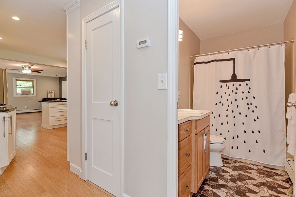 211 Beacon Street Framingham, MA 01701 - Photo 21 of 42 a bathroom with a sink toilet and shower