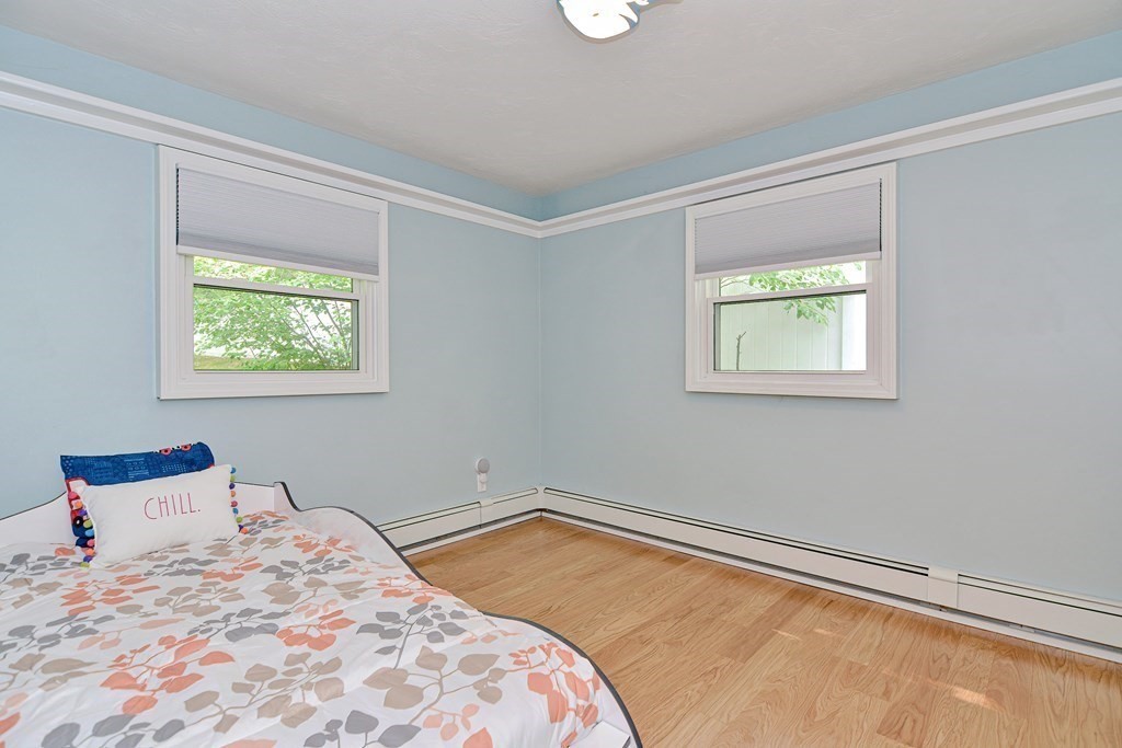 211 Beacon Street Framingham, MA 01701 - Photo 23 of 42 a bedroom with a bed and a window
