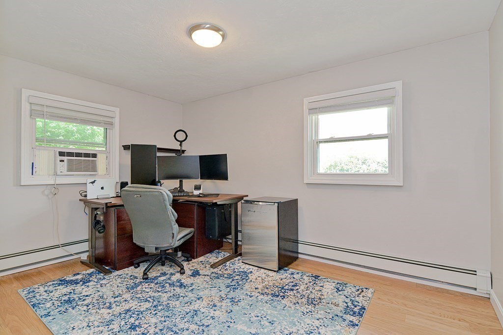 211 Beacon Street Framingham, MA 01701 - Photo 25 of 42 a workspace with furniture and a window