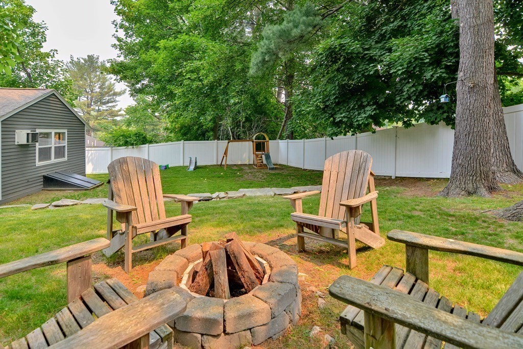 211 Beacon Street Framingham, MA 01701 - Photo 37 of 42 a view of backyard with seating space and trees