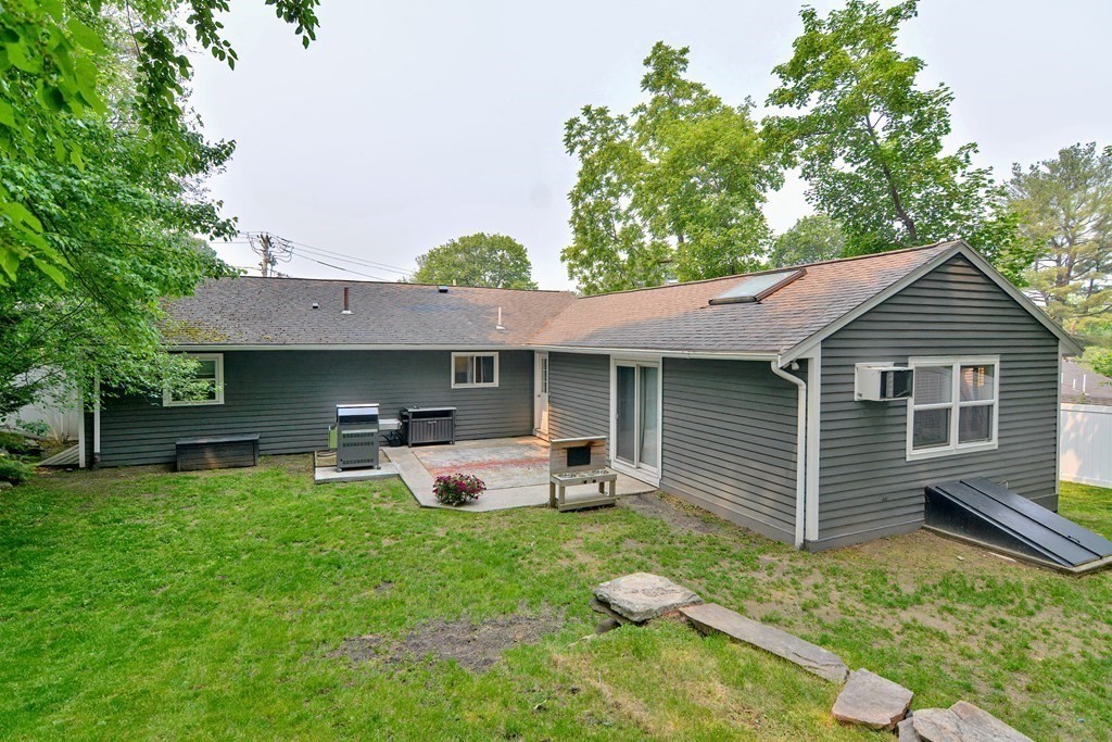 211 Beacon Street Framingham, MA 01701 - Photo 38 of 42 a front view of house with yard and outdoor seating