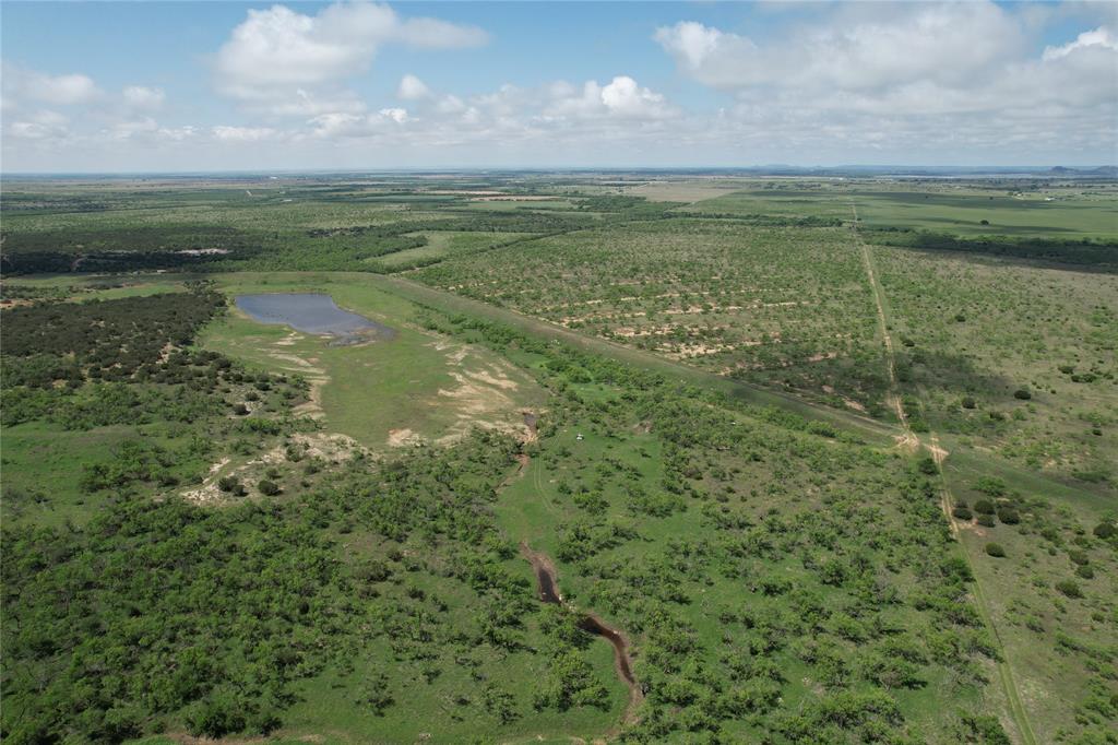 209 County Road 209 Wingate, TX 79566 - Photo 5 of 23 a view of a lake from a yard