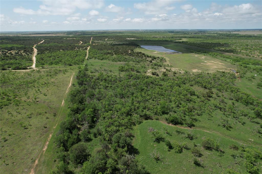 209 County Road 209 Wingate, TX 79566 - Photo 10 of 23 a view of a lake from a yard