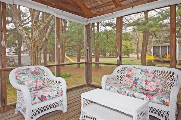 5 Woodside Road Framingham, MA 01701 - Photo 4 of 13 a bedroom with a bed and a large window with outer view