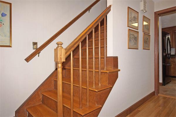 5 Woodside Road Framingham, MA 01701 - Photo 8 of 13 a view of balcony with wooden floor and stairs
