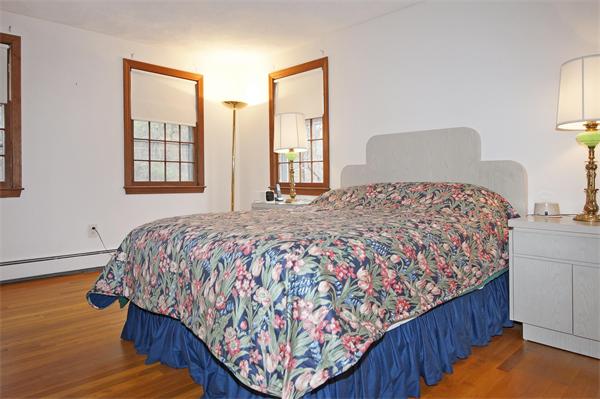 5 Woodside Road Framingham, MA 01701 - Photo 9 of 13 a bedroom with a bed and window