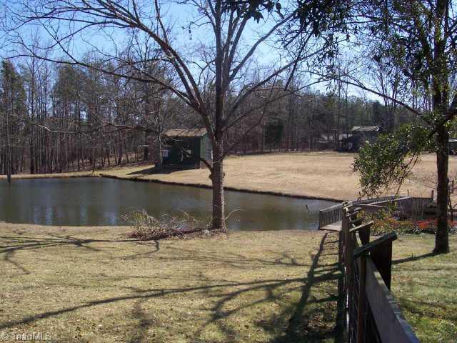 1116 Ritters Lake Road Greensboro, NC 27406 - Photo 3 of 6 Other. This property borders this scenic pond with great little bridge across the creek.