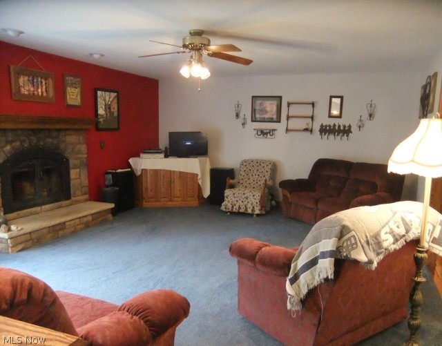 7405 State Road Wadsworth, OH 44281 - Photo 8 of 25 Family room is carpeted and with stone fireplace