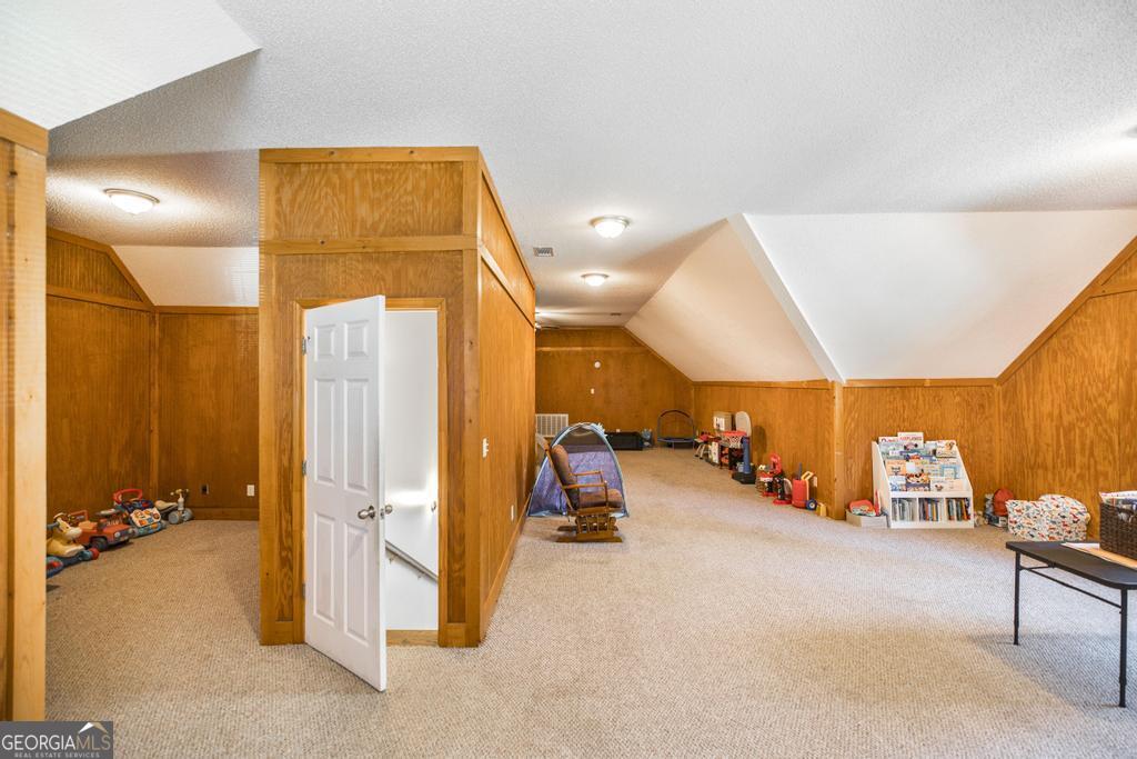 119 William D Street Cochran, GA 31014 - Photo 27 of 42 a view of a room with gym equipment