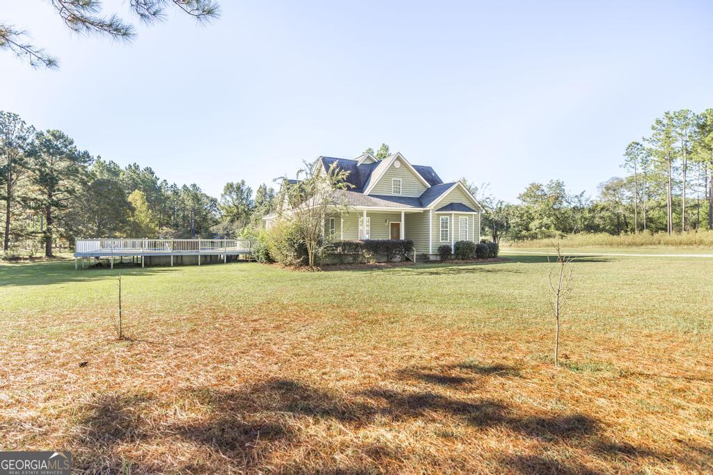 119 William D Street Cochran, GA 31014 - Photo 4 of 42 a house with swimming pool