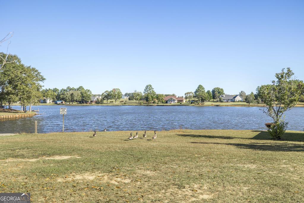119 William D Street Cochran, GA 31014 - Photo 42 of 42 a view of a swimming pool and an outdoor space