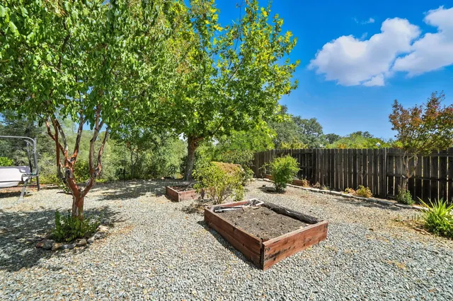 a view of backyard with furniture