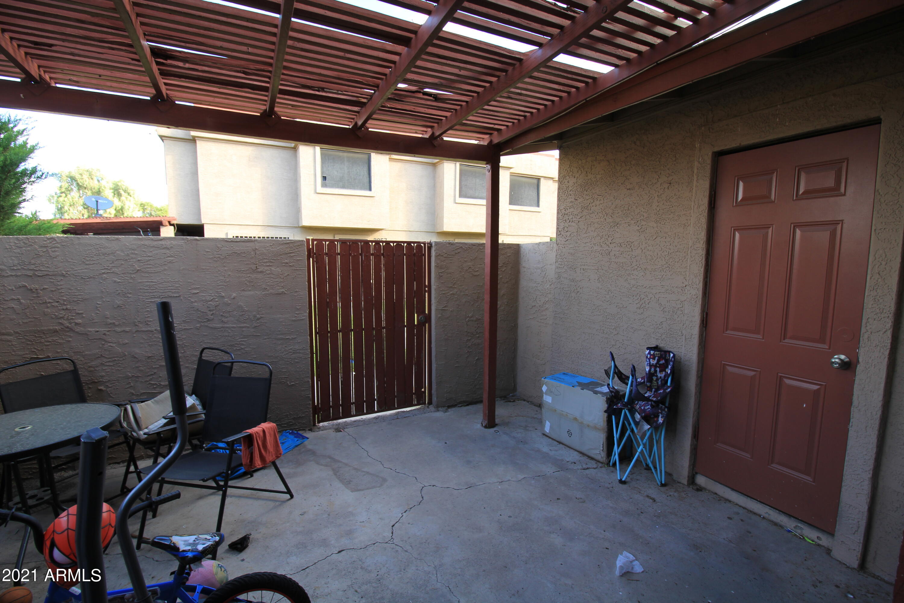 3958 West Palomino Road Phoenix, AZ 85019 - Photo 10 of 11 Patio with storage access