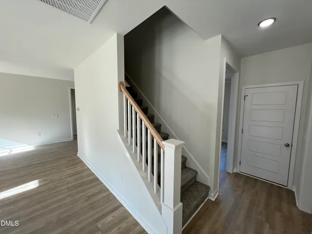 an entryway in a hall with an entryway