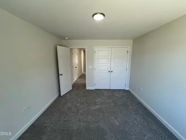 a bathroom with a sink double vanity granite tub and shower