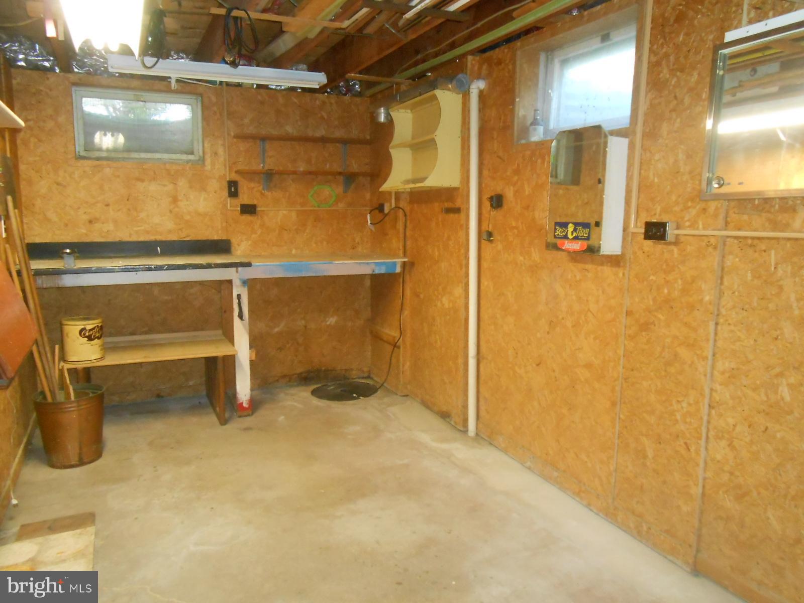 11228 Angleberger Road Thurmont, MD 21788 - Photo 19 of 25 workshop area if unfinished basement