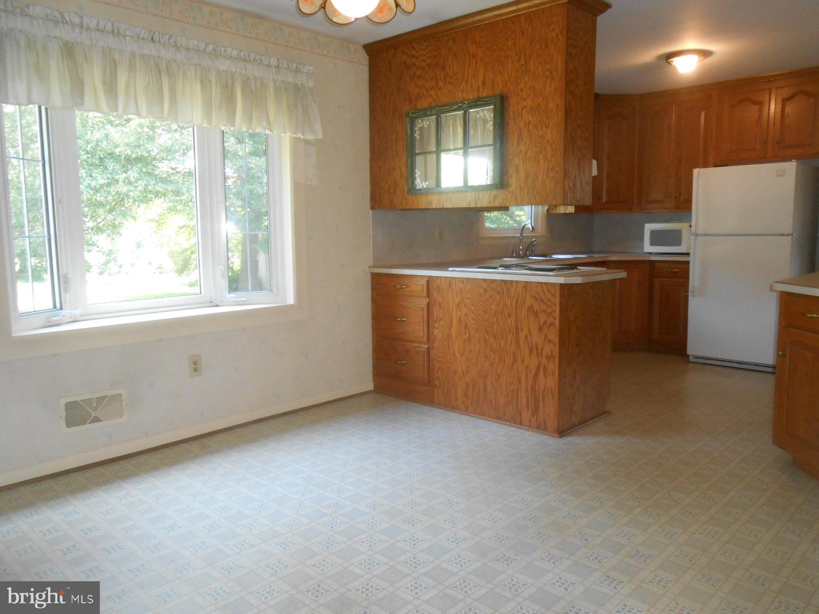 11228 Angleberger Road Thurmont, MD 21788 - Photo 4 of 25 dining room looking into kitchen