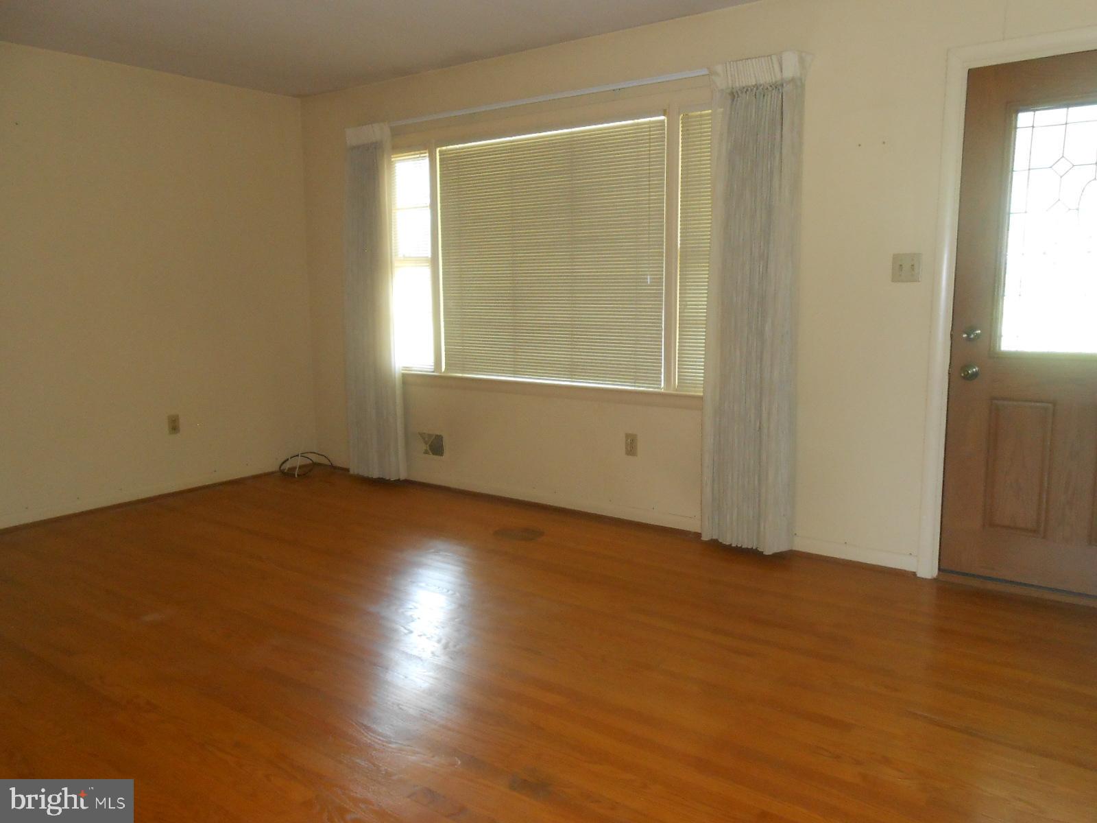 11228 Angleberger Road Thurmont, MD 21788 - Photo 6 of 25 living room - front window & door