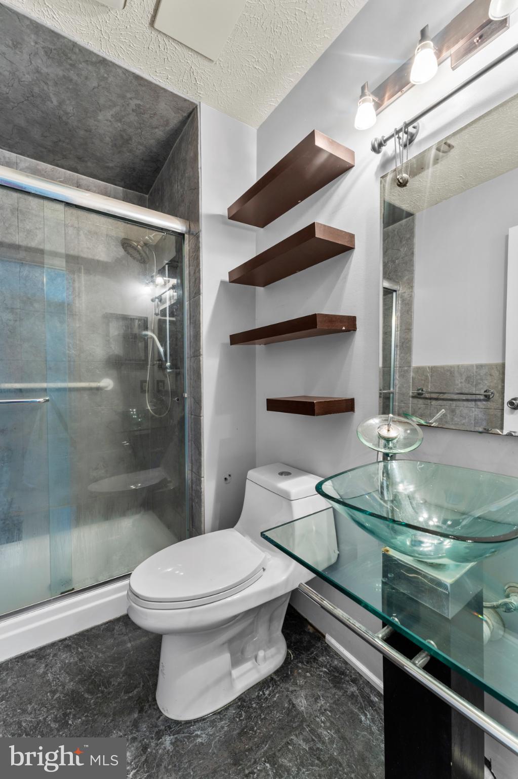 3189 Ebbtide Drive Edgewood, MD 21040 - Photo 21 of 33 Sleek modern bathroom with stylish accents.